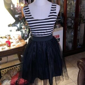 Black Poppy Small dress. Adora. It has Black & cream stripes top and black skirt